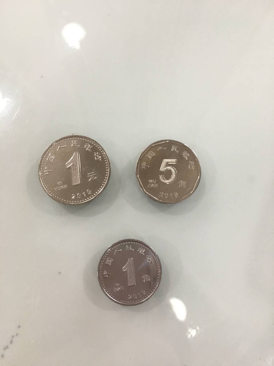 济宁人注意5角硬币变颜色新版人民币在济宁投放